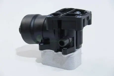 Корпус масляного фильтра VW Caddy III/Crafter/T5 1.6TDI/2.0TDI 09- (с теплообменником) AUTOTECHTEILE 311 7003